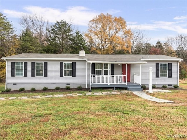 ranch-style home featuring a porch and a front yard