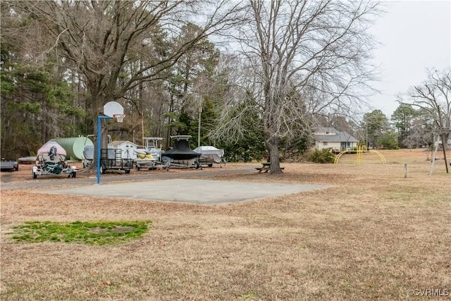 view of yard featuring basketball court