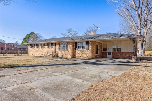 view of front of property with a carport