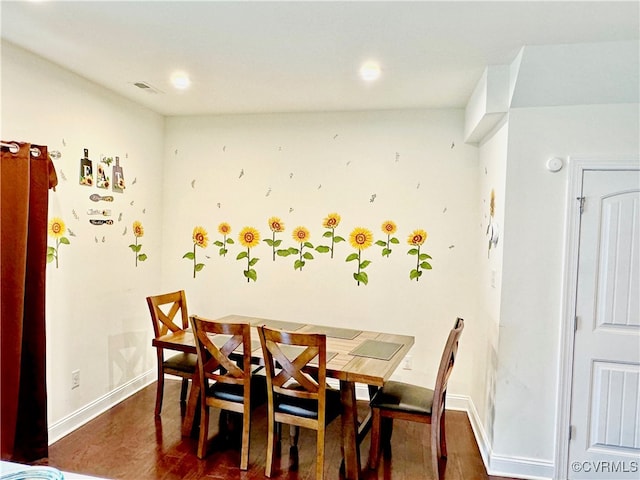 dining room featuring dark hardwood / wood-style floors