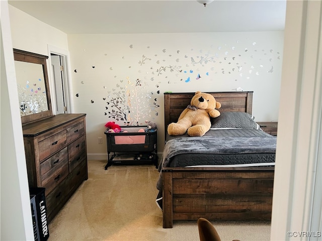 bedroom with light colored carpet