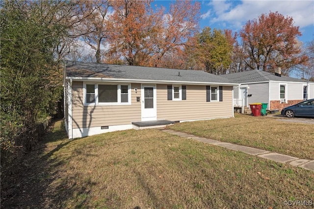 single story home with a front lawn