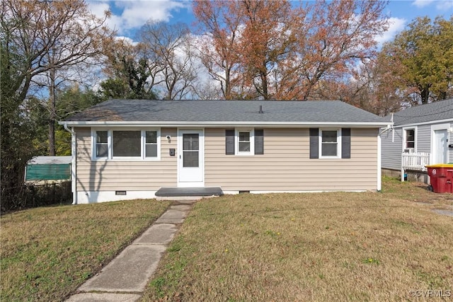 single story home with a front lawn