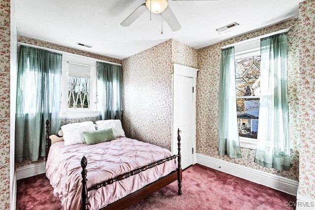 carpeted bedroom featuring ceiling fan