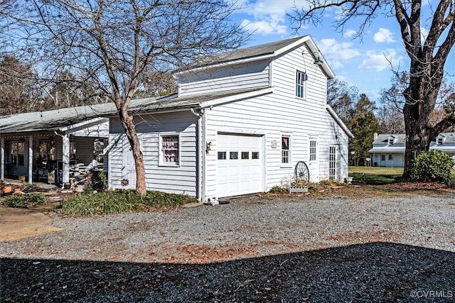 view of property exterior with a garage