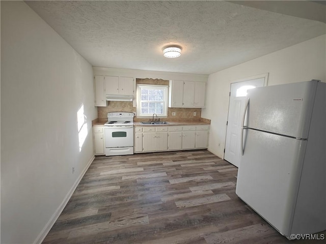 kitchen with sink, white cabinetry, light wood-type flooring, white appliances, and decorative backsplash