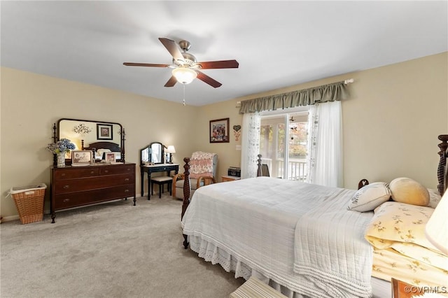 bedroom featuring access to outside, ceiling fan, and light carpet