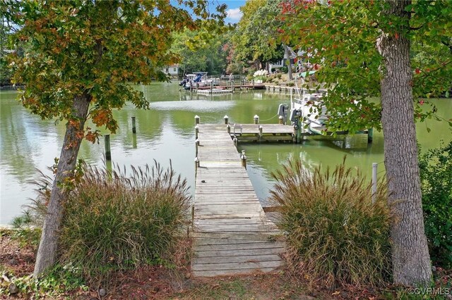 view of dock with a water view