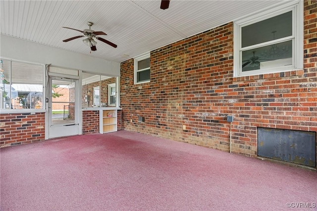 view of patio featuring ceiling fan