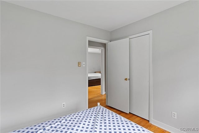 bedroom featuring light wood-type flooring