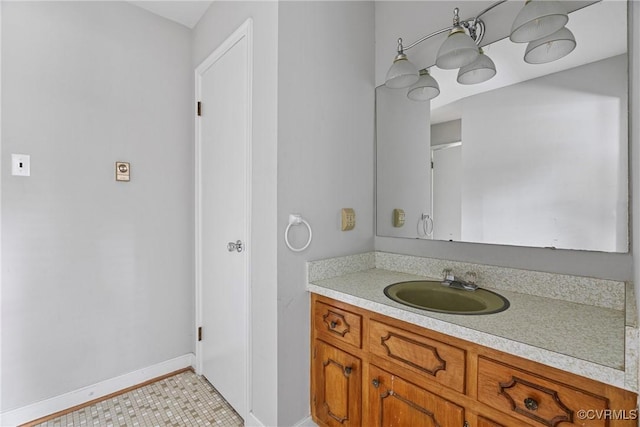 bathroom with tile patterned flooring and vanity