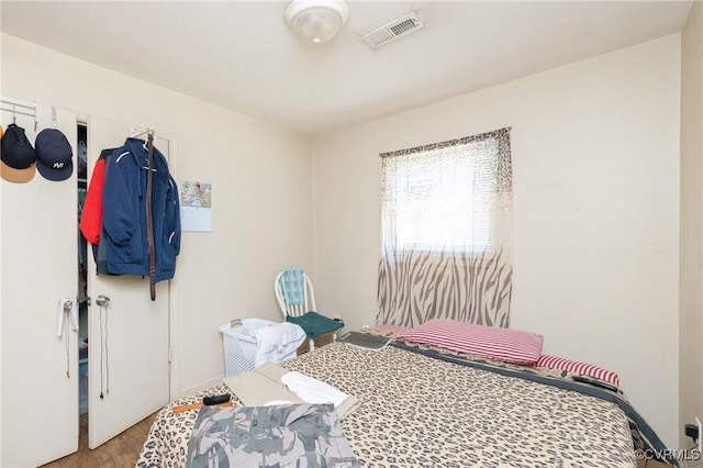 bedroom featuring light hardwood / wood-style flooring