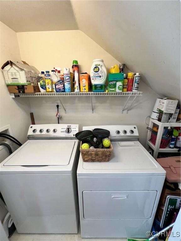 laundry area with washing machine and clothes dryer