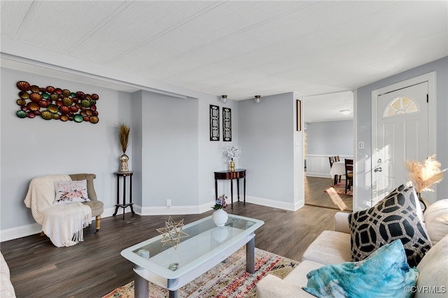 living room with dark hardwood / wood-style floors