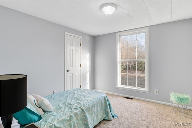 bedroom featuring carpet