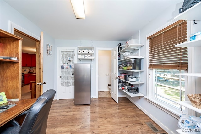 office area with light wood-type flooring