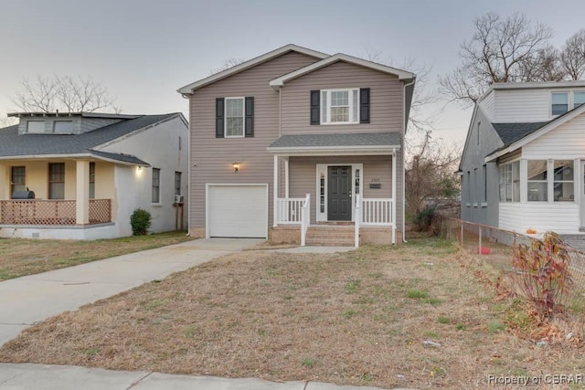 view of front property with a garage