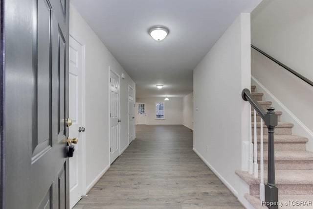 hallway with light wood-type flooring