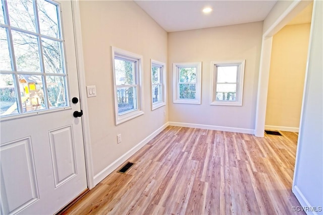 foyer with light hardwood / wood-style flooring