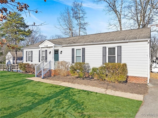 ranch-style house with a front yard