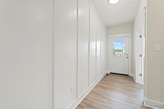 corridor featuring light hardwood / wood-style flooring