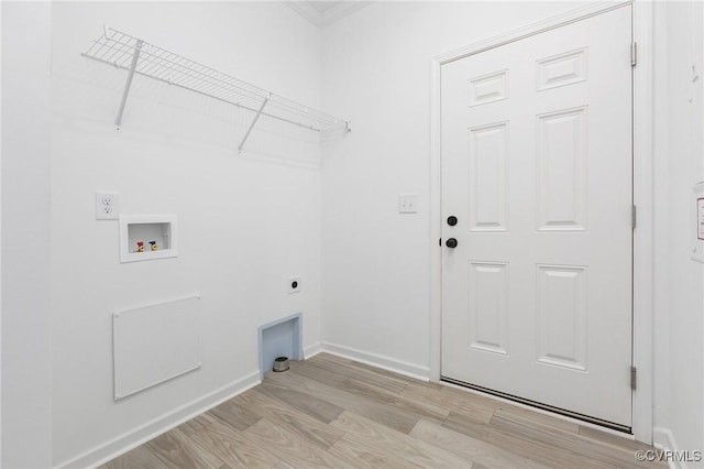 laundry area featuring hookup for an electric dryer, hookup for a washing machine, and light hardwood / wood-style flooring