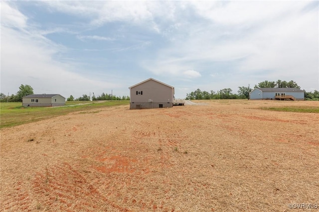 view of yard featuring a rural view