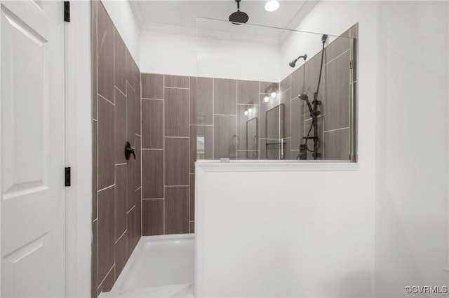 bathroom featuring a shower and ornamental molding