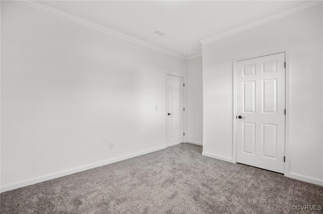 carpeted empty room with ornamental molding