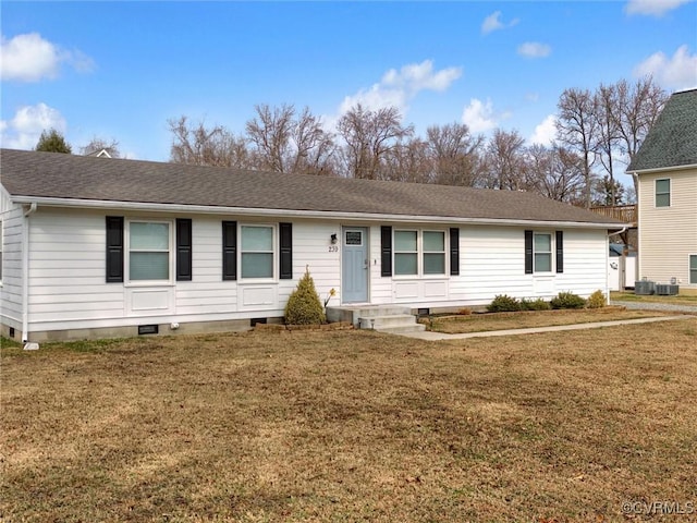 ranch-style home featuring a front yard and central AC