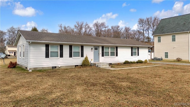 view of front facade featuring a shingled roof, a front yard, central AC unit, and crawl space