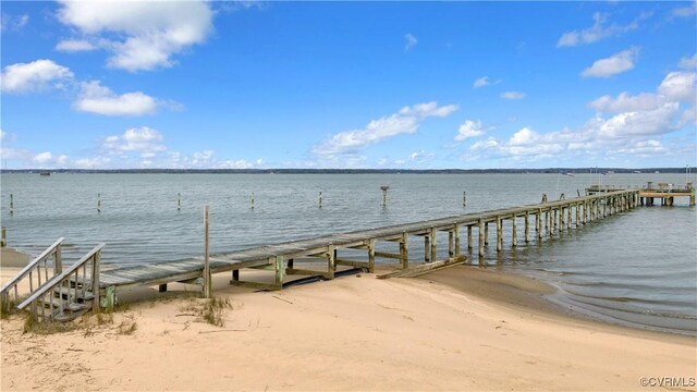 dock area with a water view