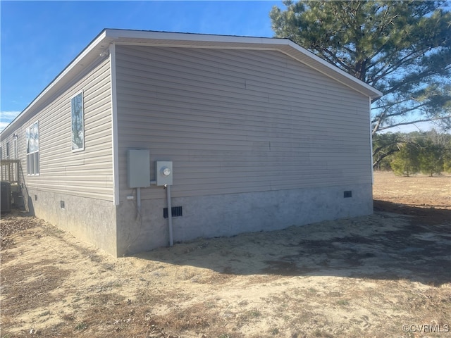 view of property exterior with central AC unit