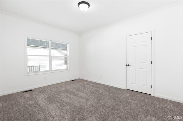 unfurnished room featuring carpet and ornamental molding