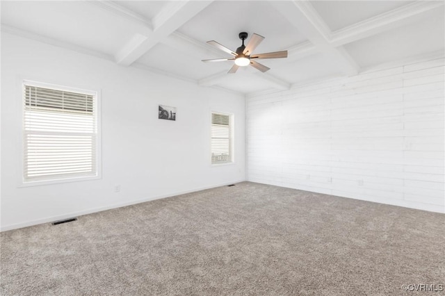 carpeted empty room with beam ceiling, ceiling fan, and coffered ceiling