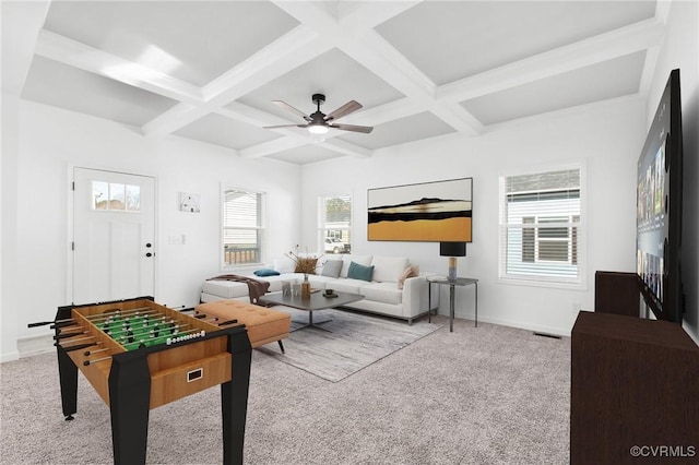 recreation room with coffered ceiling, beam ceiling, and light carpet