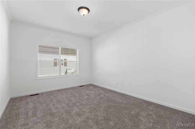 empty room with carpet and ornamental molding