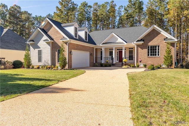 5080 Brandon Pines Way, Providence Forge, VA 23140 - view of front of property with concrete driveway, a front lawn, covered porch, and brick siding