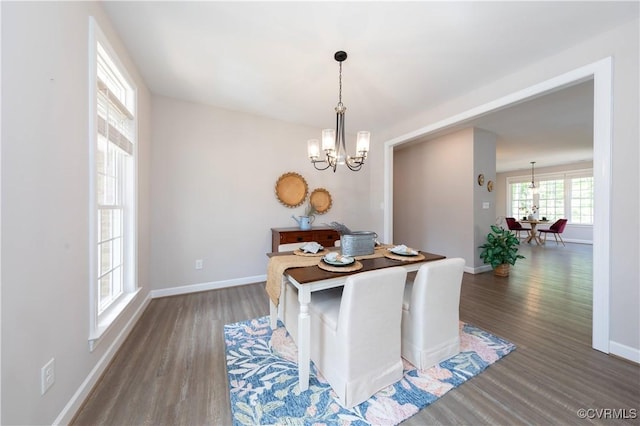 5080 Brandon Pines Way, Providence Forge, VA 23140 - dining room featuring baseboards, wood finished floors, and a chandelier