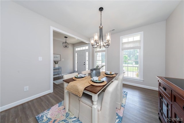 5080 Brandon Pines Way, Providence Forge, VA 23140 - dining area with visible vents, baseboards, dark wood-style flooring, and an inviting chandelier