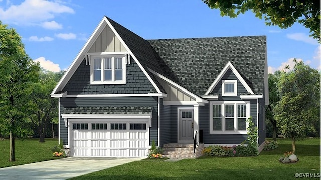 view of front of home with a front lawn and a garage