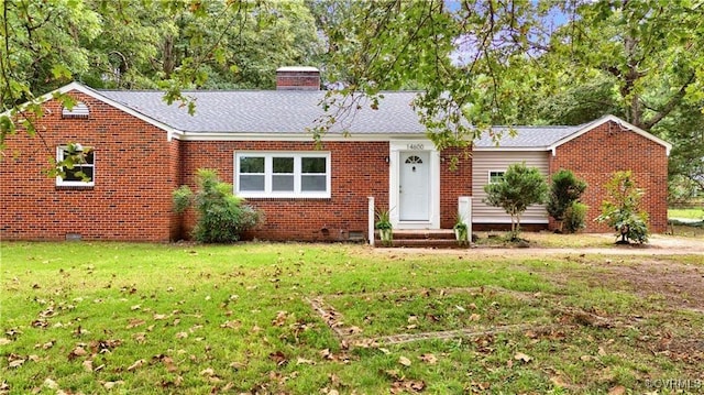 single story home featuring a front yard