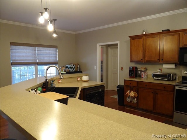 kitchen featuring pendant lighting, crown molding, black appliances, and sink