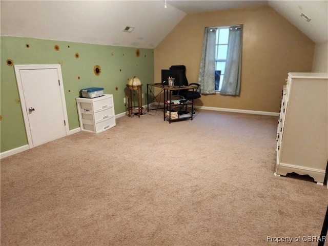 interior space featuring lofted ceiling and light carpet