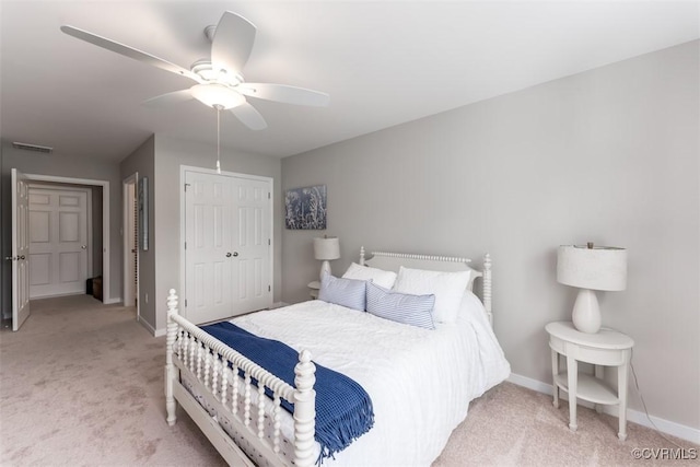 carpeted bedroom with ceiling fan