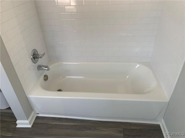 bathroom with hardwood / wood-style flooring