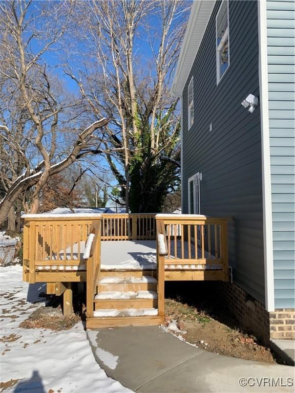 view of snow covered deck