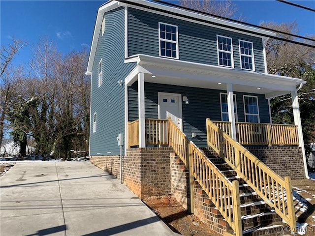 view of front property featuring a porch