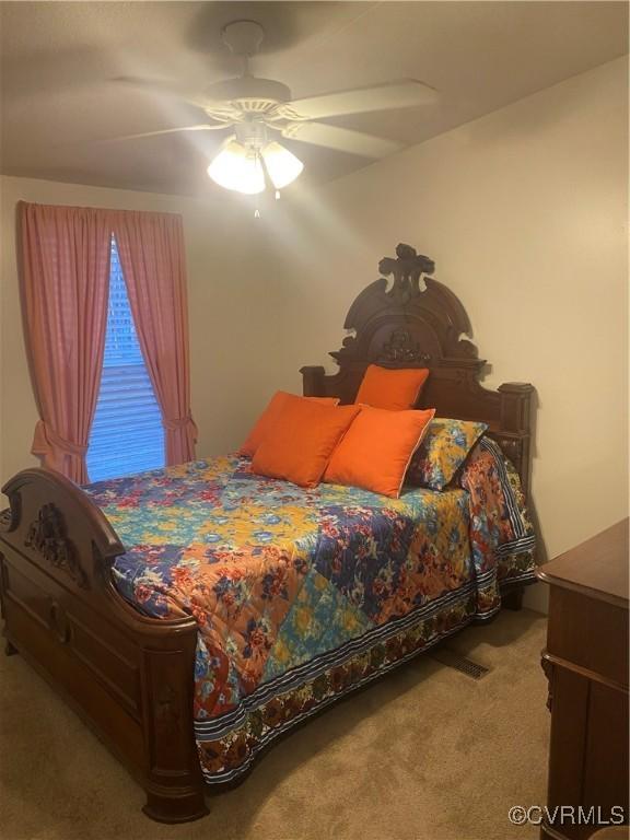 bedroom featuring carpet flooring and ceiling fan