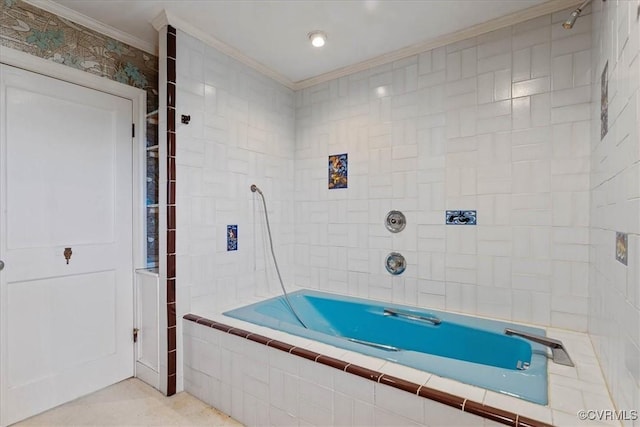 bathroom with tiled shower / bath and crown molding